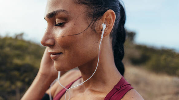 fitness girl listening to music
